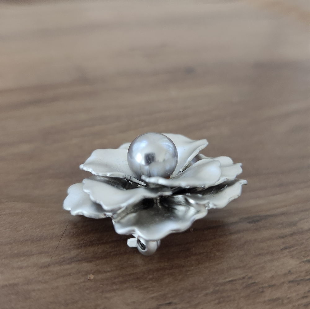 Silver plated brooches